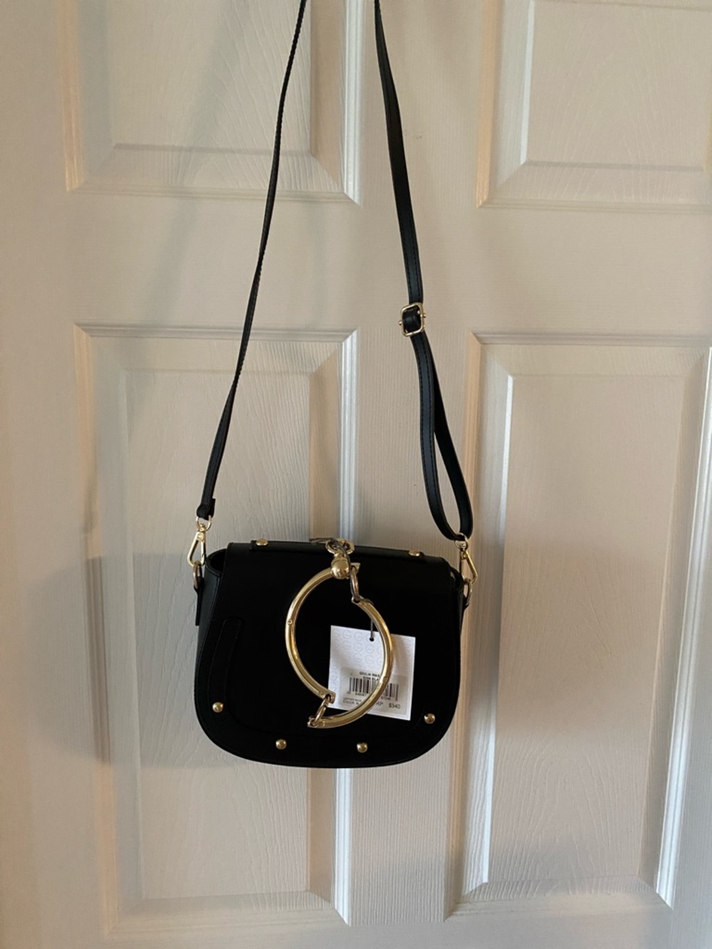 Black Crossbody Bag with Gold Ring Accent